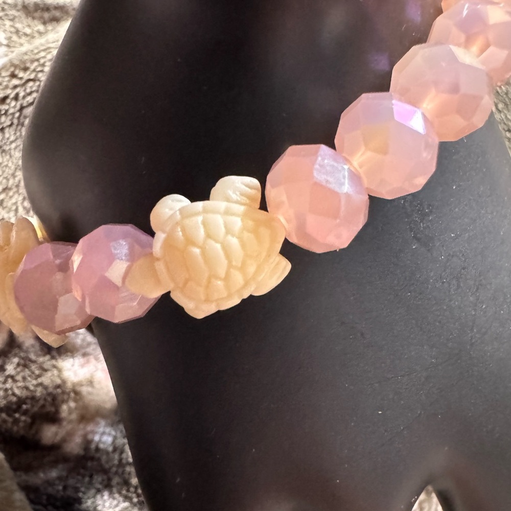 Charming Pink Beaded Bracelet with turtle Accent